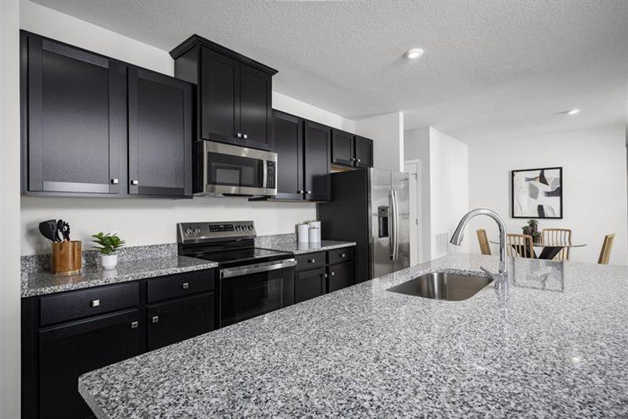 Representative furnished interior of a home built from the Coral by Ryan Homes in Touchstone, Lakeland (Image 2).