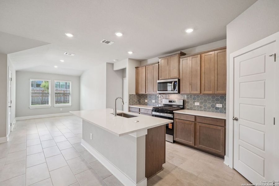 Furnished interior view inside a new home in Comanche Ridge, San Antonio (Image 11).
