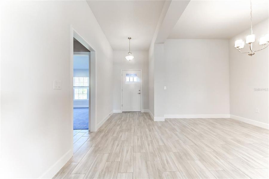 Spacious, unfurnished interior of a new home in Aviary at Rutland Ranch, Parrish (Image 28).