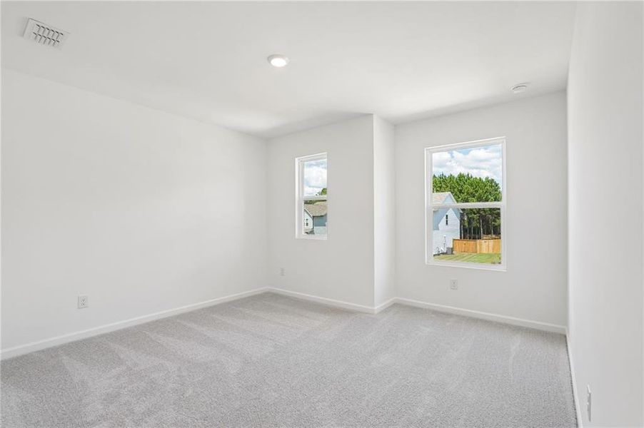 Spacious, unfurnished interior of a new home in Heritage River, Euharlee (Image 32).
