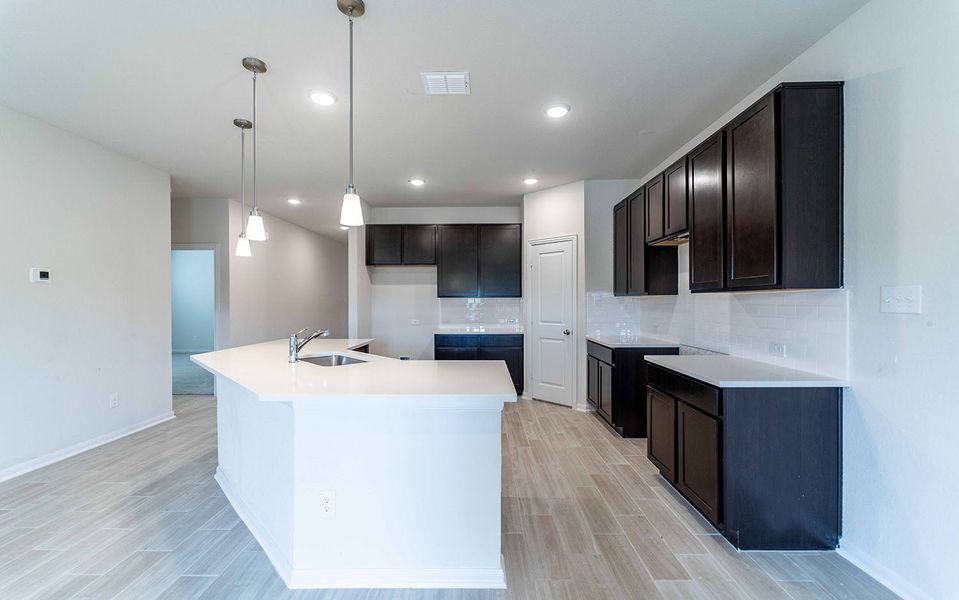 Furnished interior view inside a new home in Hunter's Ranch, San Antonio (Image 6).