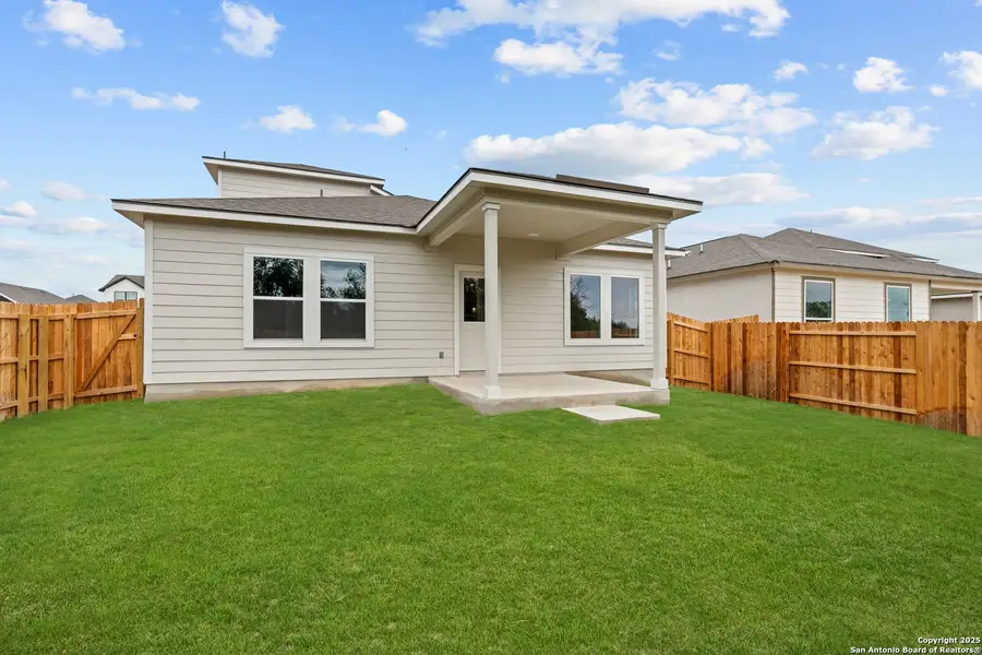 Front exterior of a new home in August Fields, New Braunfels, TX, highlighting curb appeal (Image 1). Front exterior of a new home in August Fields, New Braunfels, TX, highlighting curb appeal (Image 1).