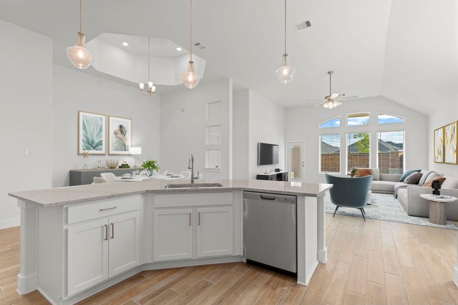 The gourmet kitchen has upgraded shaker cabinets all with beautiful hardware! Look above at that amazing ceiling for the casual dining area! Simple stunning! *Virtually Staged* Gated community of Sunterra! Beautiful Glenwood one story ranch home by CastleRock Communities! 3-car garage, huge private corner Lot! Open concept design ideal for modern living. Beautiful large plank tile wood floors throughout. Amazing family area open to the dramatic casual dining and gourmet kitchen. The gourmet kitchen has upgraded shaker cabinets all with beautiful hardware! Look above at that amazing ceiling for the casual dining area! Simple stunning! *Virtually Staged* Gated community of Sunterra! Beautiful Glenwood one story ranch home by CastleRock Communities! 3-car garage, huge private corner Lot! Open concept design ideal for modern living. Beautiful large plank tile wood floors throughout. Amazing family area open to the dramatic casual dining and gourmet kitchen.