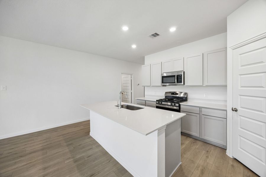 Furnished interior view inside a new home in Meridiana, Manvel (Image 8).