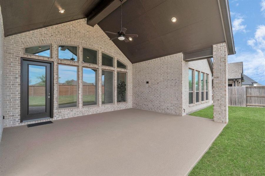 Oversized patio with 16' vaulted ceiling includes a gas line for a future outdoor kitchen.