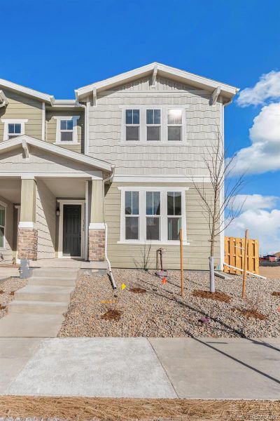 Exterior details and patio area of a home in Turnberry, Commerce City (Image 3).
