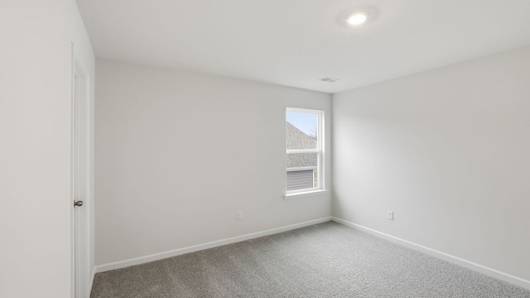 Spacious, unfurnished interior of a new home in Durbin Meadows Traditions, Fountain Inn (Image 27).