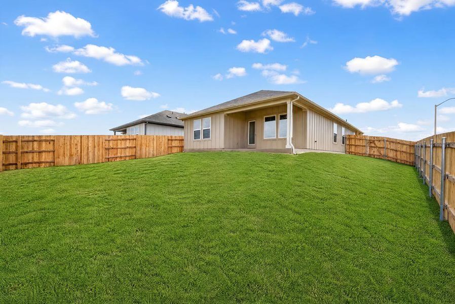 Exterior details and patio area of a home in Sunfield, Buda (Image 17).