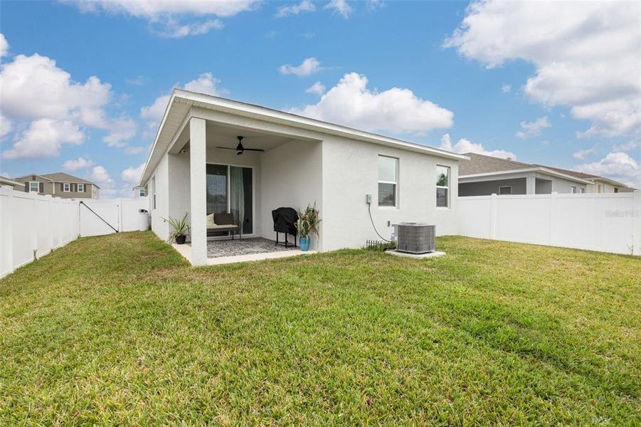 covered patio with fenced yard