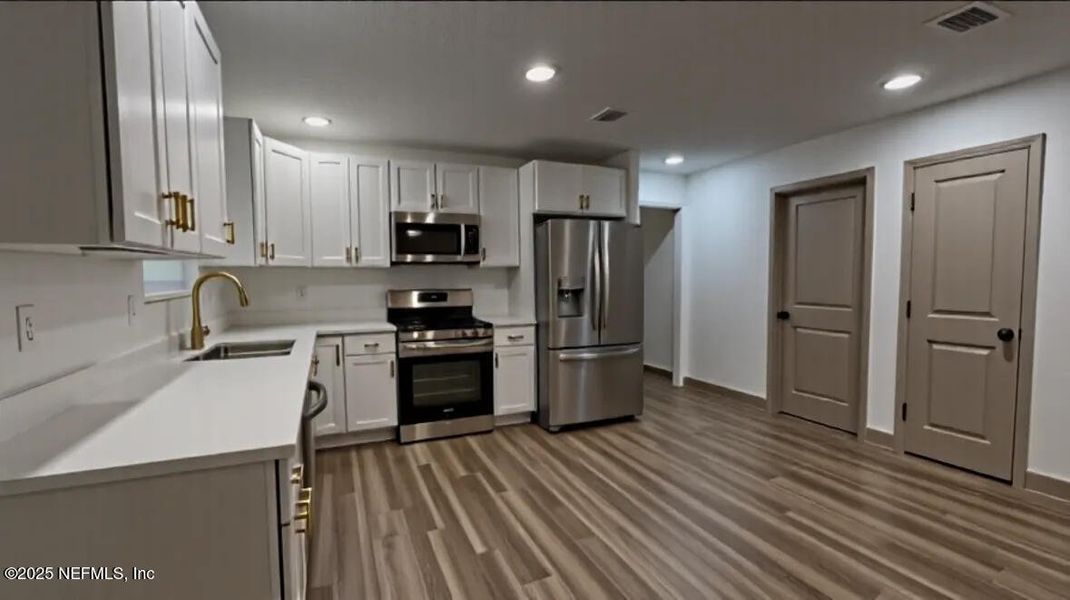 Furnished interior view inside a new home in , Jacksonville (Image 5). Furnished interior view inside a new home in , Jacksonville (Image 5).