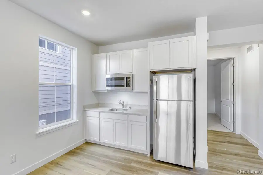 Furnished interior view inside a new home in Newlin Crossing, Parker (Image 9).