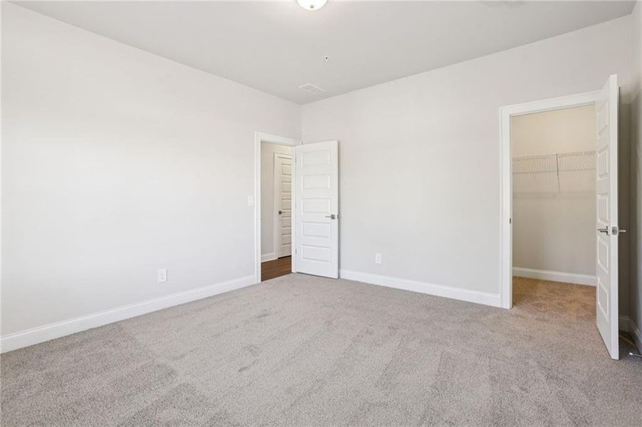 Spacious, unfurnished interior of a new home in Hemingway - Highland Series, Cumming (Image 39).