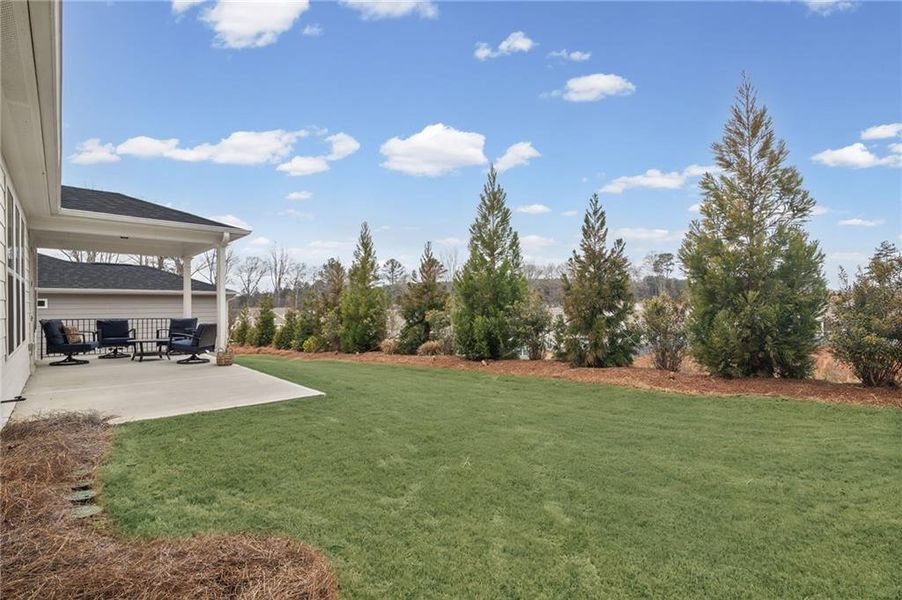 Exterior details and patio area of a home in Sun City Peachtree, Griffin (Image 24).