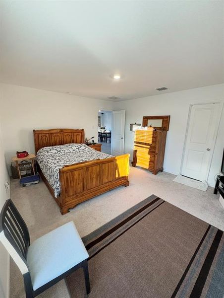 Bedroom featuring carpet flooring and recessed lighting