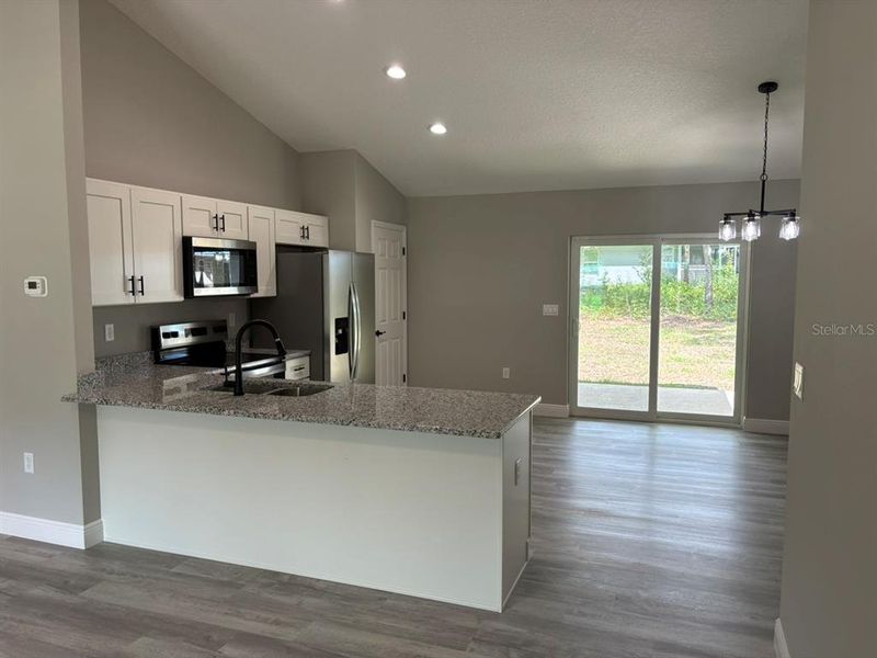 Furnished interior view inside a new home in , Dunnellon (Image 8).