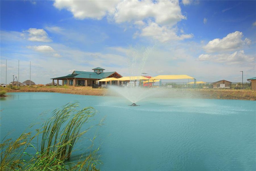 Expansive pond with an active fountain feature