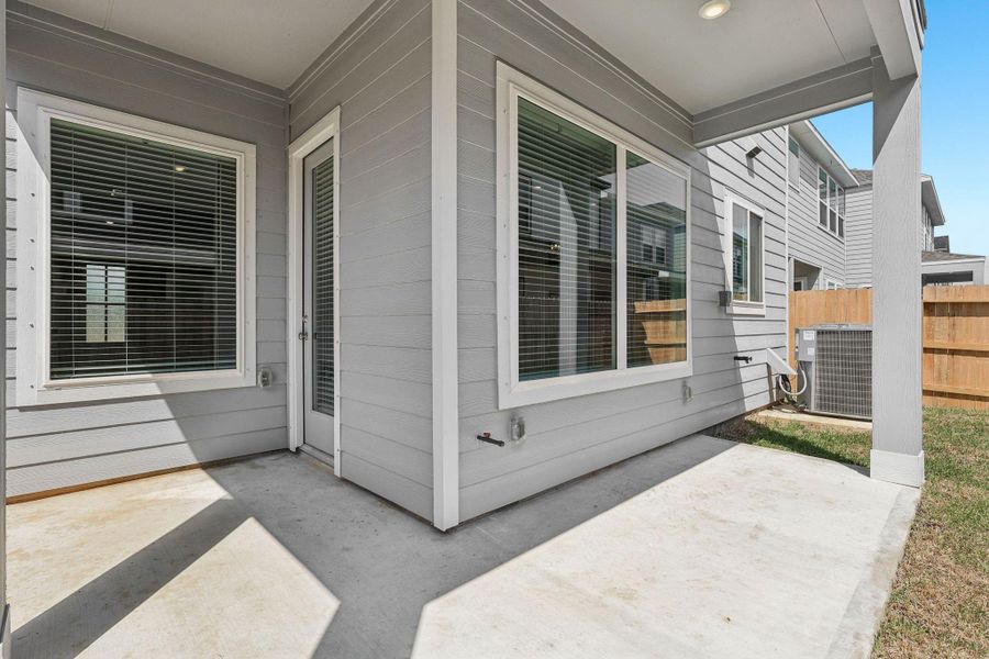 Exterior details and patio area of a home in Kemah Crossing - Luxe Series, Kemah (Image 3). Exterior details and patio area of a home in Kemah Crossing - Luxe Series, Kemah (Image 3).