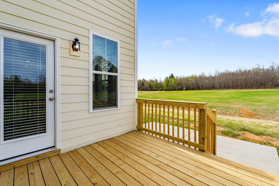 Exterior details and patio area of a home in Lilah Grove, Summerfield (Image 4).