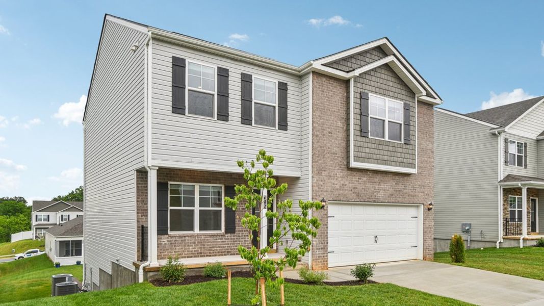 Front exterior of a new home in Archer's Pointe, Johnson City, TN, highlighting curb appeal (Image 21).