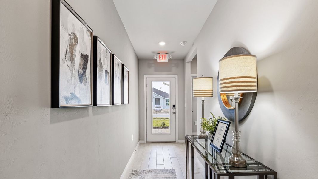 Furnished interior view inside a new home in Bentley Crossing, Fort Myers (Image 4). Furnished interior view inside a new home in Bentley Crossing, Fort Myers (Image 4).