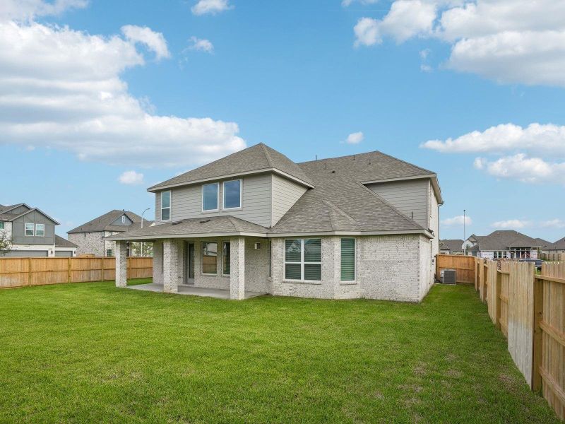 Exterior details and patio area of a home in Massey Oaks - Estate Series, Pearland (Image 25).