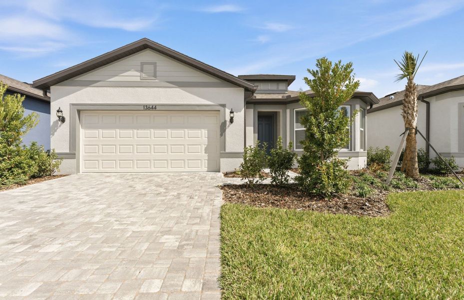 Representative exterior photo of a completed home built from the Mainstay by Del Webb in Del Webb Oak Creek, North Fort Myers, FL (Image 20).