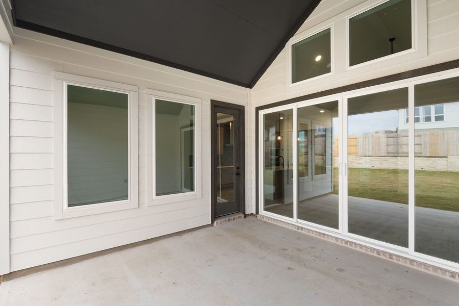Exterior details and patio area of a home in Lariat, Liberty Hill (Image 28). Exterior details and patio area of a home in Lariat, Liberty Hill (Image 28).