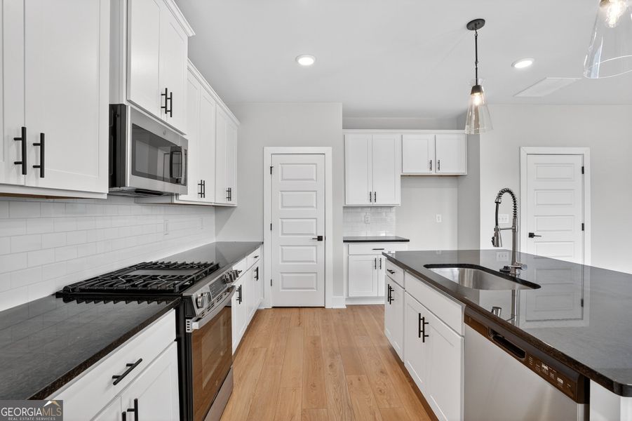 Furnished interior view inside a new home in The Fairways at Mirror Lake, Villa Rica (Image 11).