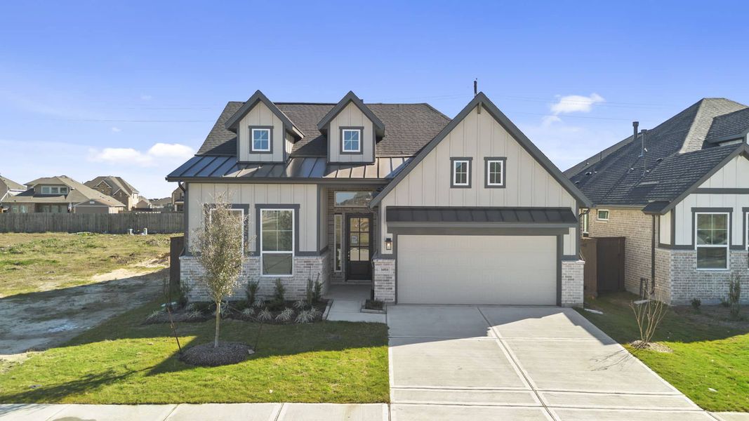 Front exterior of a new home in Beacon Point, Texas City, TX, highlighting curb appeal (Image 21).