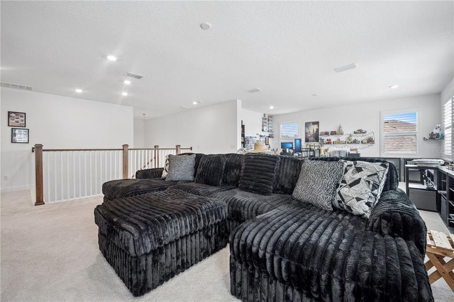 Furnished interior view inside a new home in Northlake at Ovation, Winter Garden (Image 34).