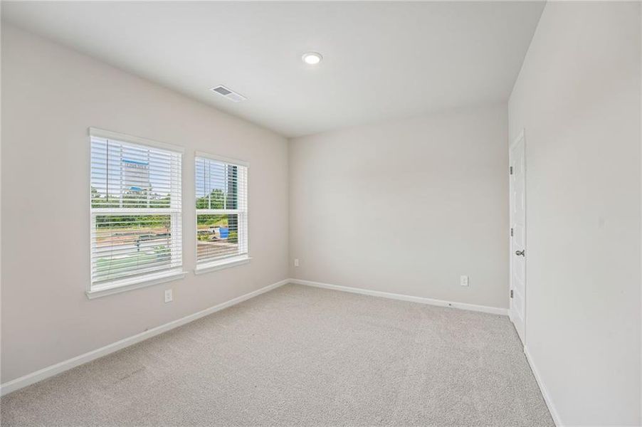 Spacious, unfurnished interior of a new home in Hemingway - Highland Series, Cumming (Image 37).