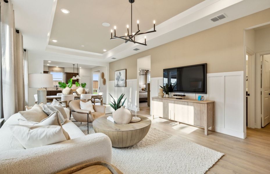 Spacious gathering room with tray ceiling