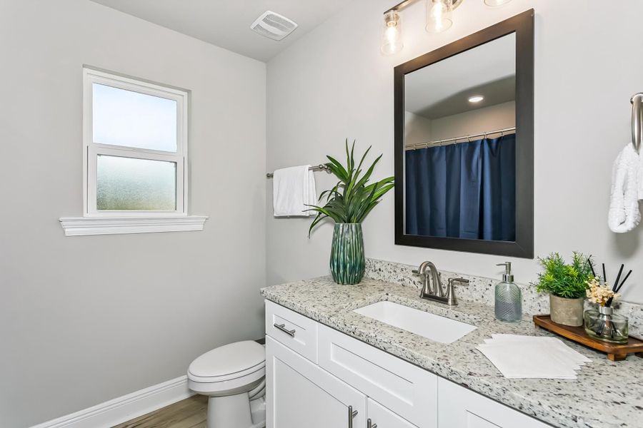 Furnished interior view inside a new home in Buckeyes Landing, Navarre (Image 32).