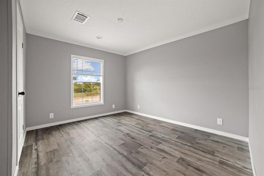Spacious, unfurnished interior of a new home in , Okeechobee (Image 20).
