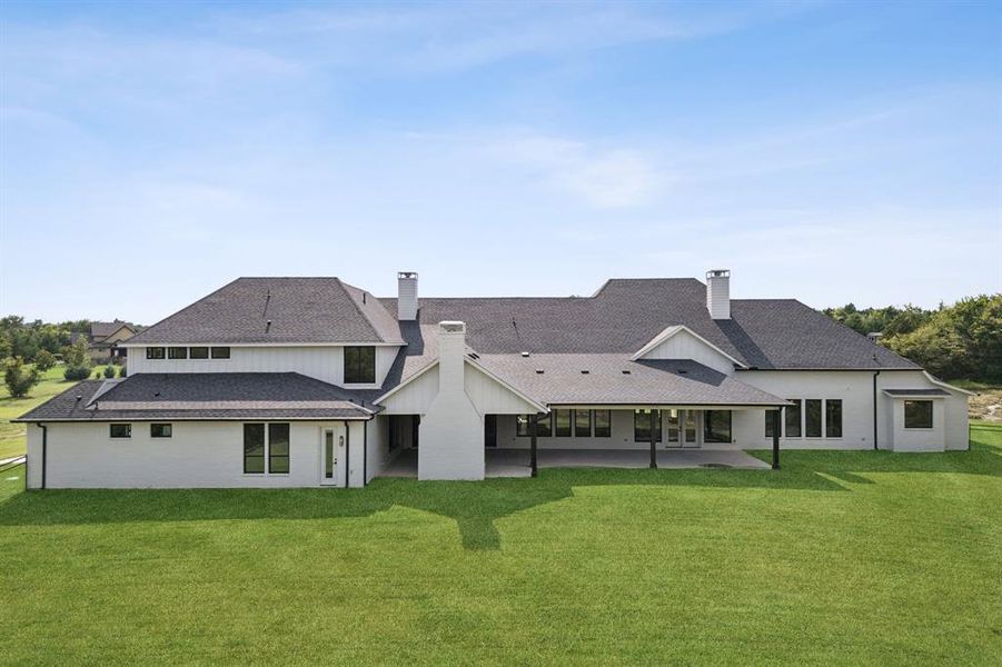 Nice view of the expansive back of the house. Nice view of the expansive back of the house.