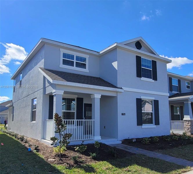 Front exterior of a new home in , Orlando, FL, highlighting curb appeal (Image 22).