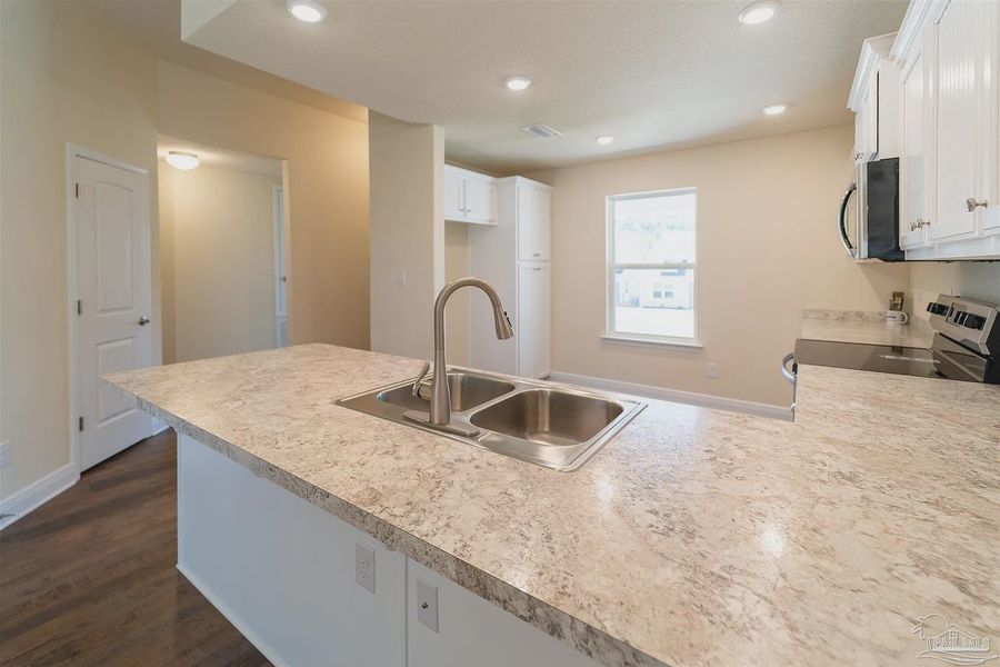 Furnished interior view inside a new home in Westpointe Place, Pensacola (Image 3).