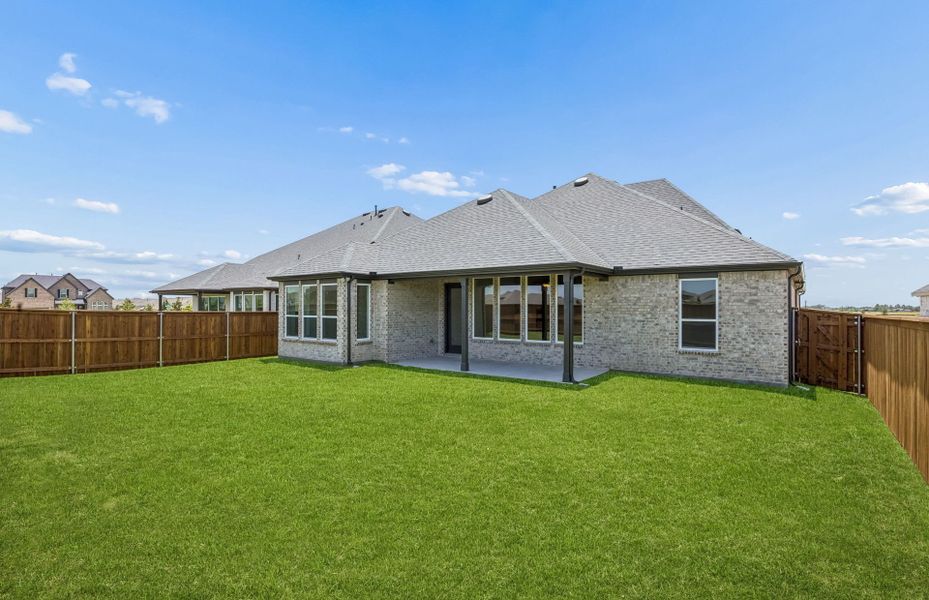 Exterior details and patio area of a home in Overland Grove, Forney (Image 2). Exterior details and patio area of a home in Overland Grove, Forney (Image 2).