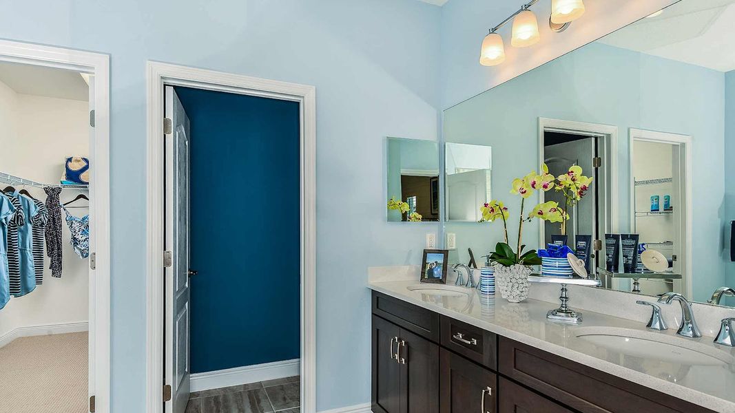 Furnished interior view inside a new home in SkySail Real Estate and Homes for Sale in Naples, FL - Neal Communities, Naples (Image 12).