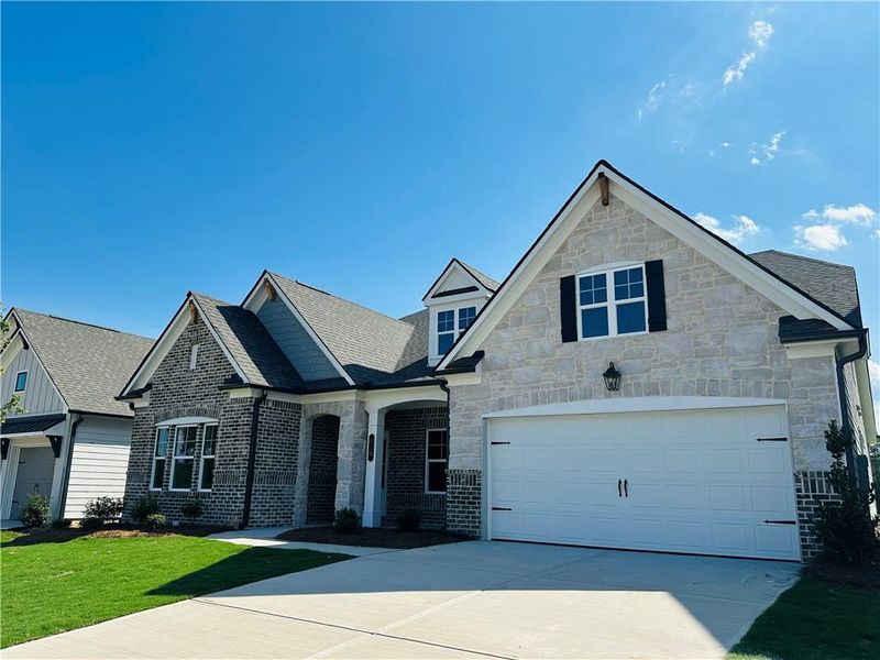 Front exterior of a new home in Summerlin, Winder, GA, highlighting curb appeal (Image 29).