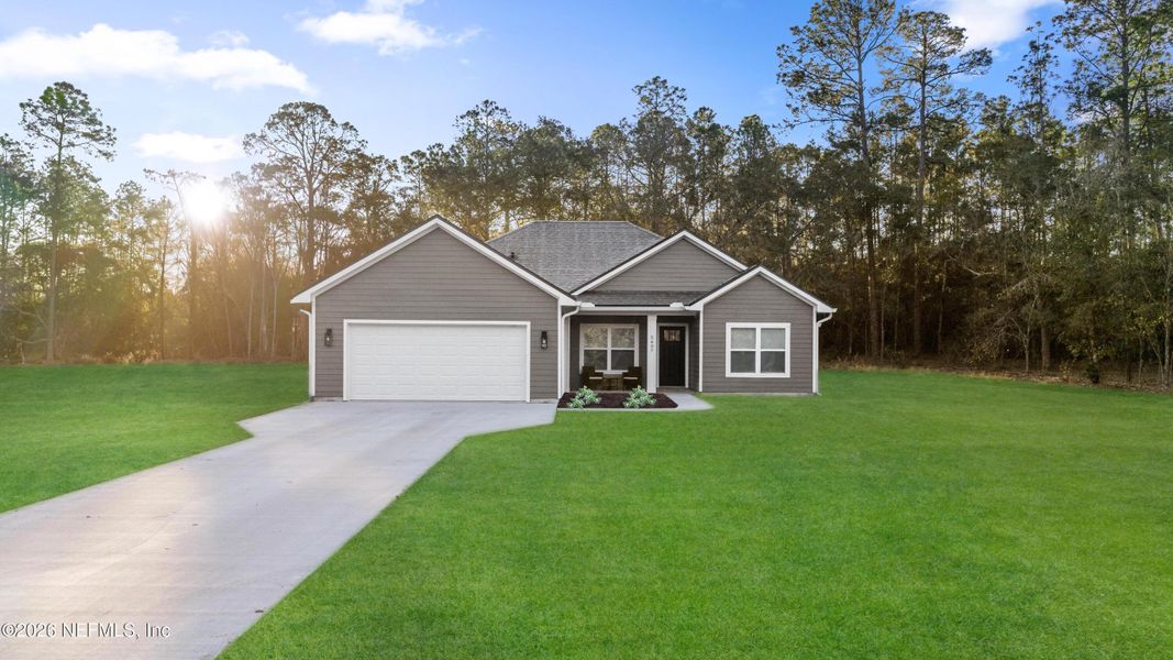 Front exterior of a new home in , Keystone Heights, FL, highlighting curb appeal (Image 23). Front exterior of a new home in , Keystone Heights, FL, highlighting curb appeal (Image 23).