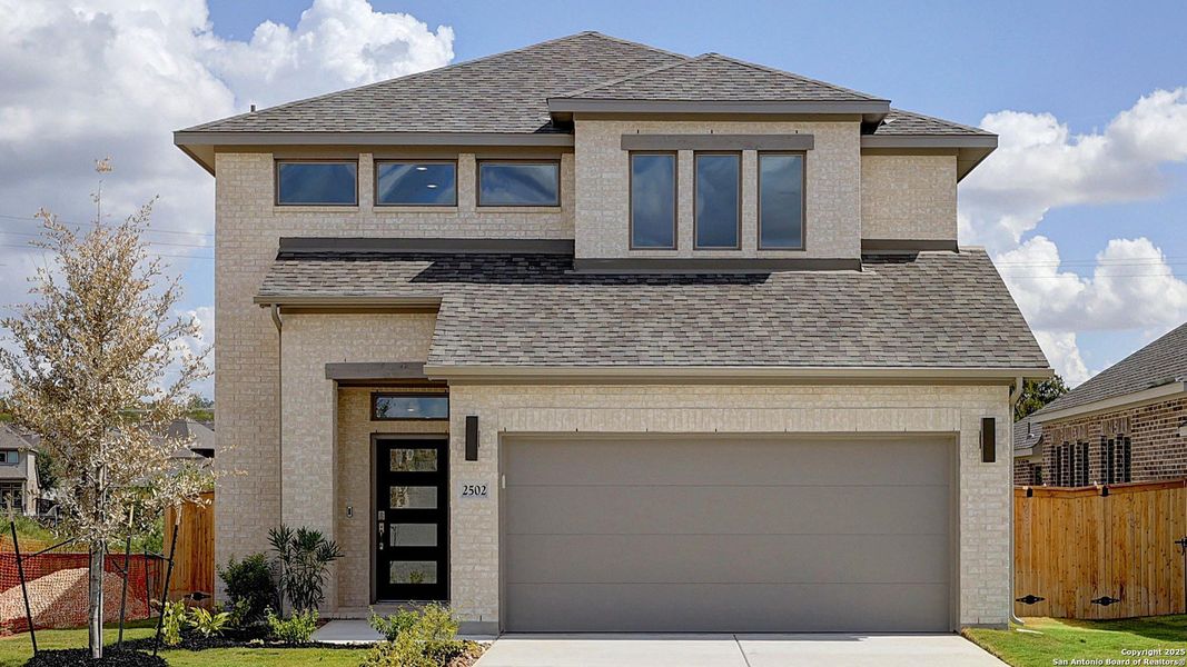 Front exterior of a new home in Ladera 40', San Antonio, TX, highlighting curb appeal (Image 19).