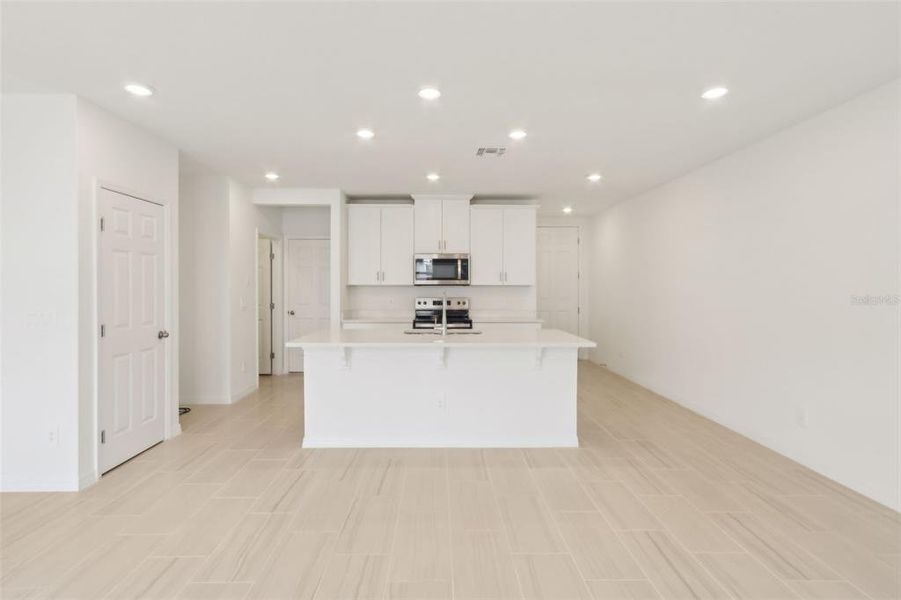 Furnished interior view inside a new home in The Meadow at Crossprairie Townes, St. Cloud (Image 5).
