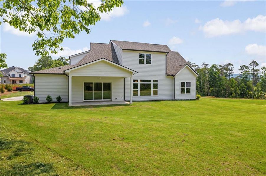Front exterior of a new home in , Canton, GA, highlighting curb appeal (Image 21).