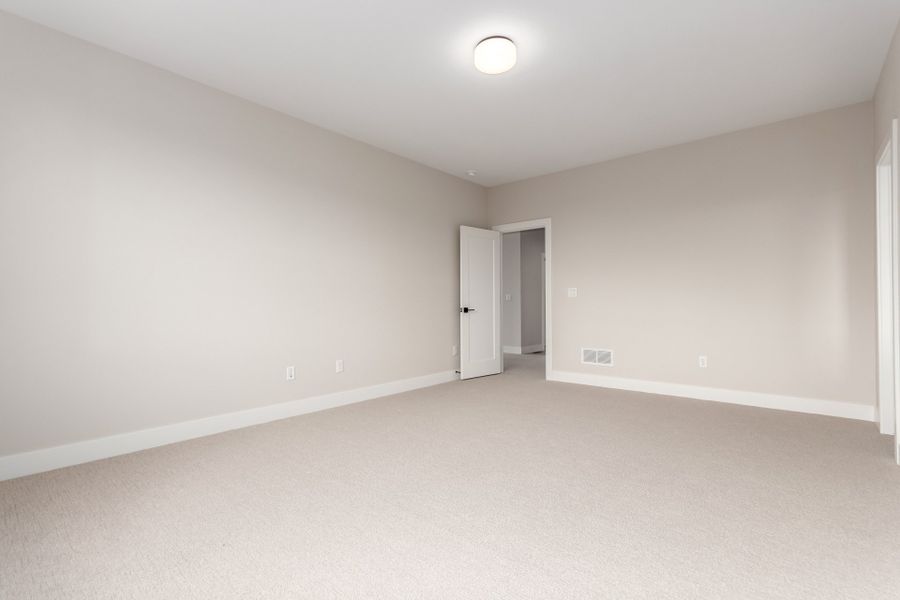 Spacious, unfurnished interior of a new home in West Grange, Longmont (Image 39).