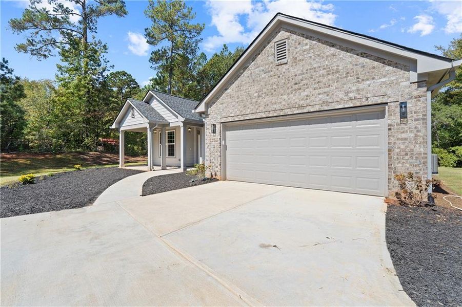 Front exterior of a new home in , Gray, GA, highlighting curb appeal (Image 27).