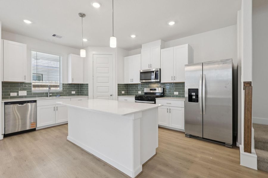 Furnished interior view inside a new home in Pine Lake Cove - Traditional Series, Montgomery (Image 4).