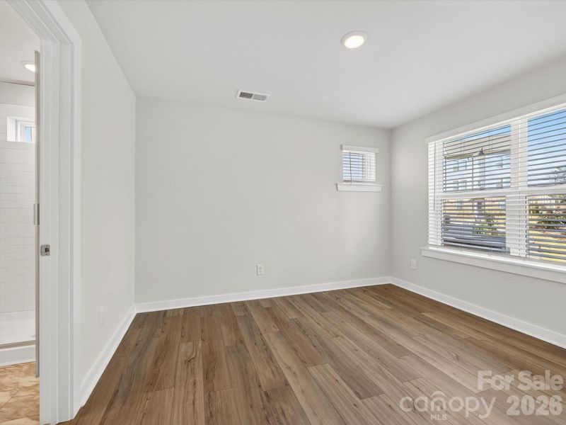 Spacious, unfurnished interior of a new home in Central Living at Craig, Charlotte (Image 23).