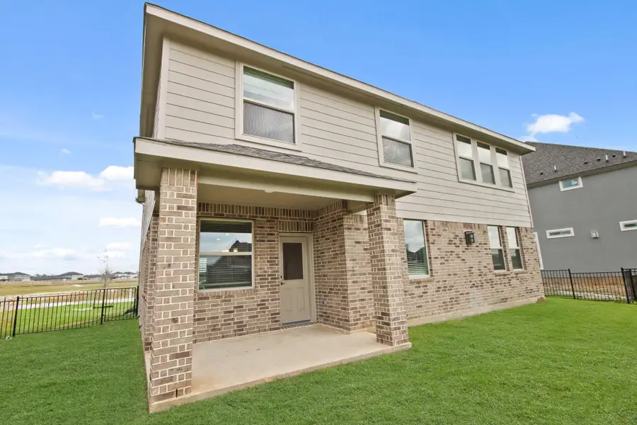 Peaceful backyard with covered patio