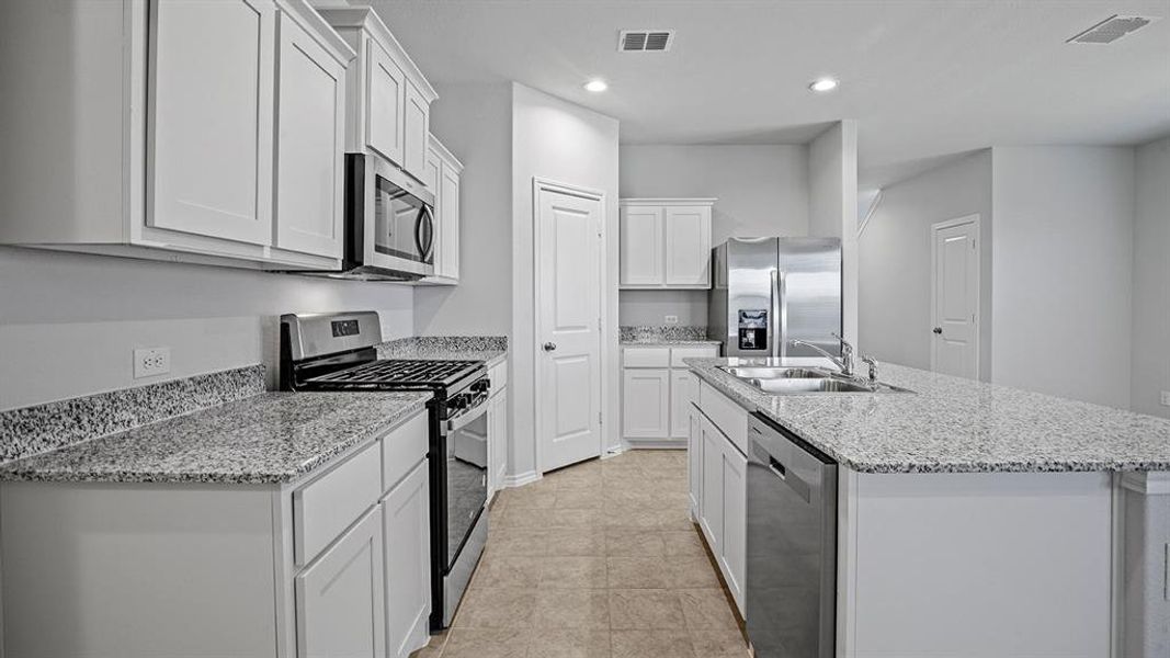 Furnished interior view inside a new home in Springhill South, Boyd (Image 13).